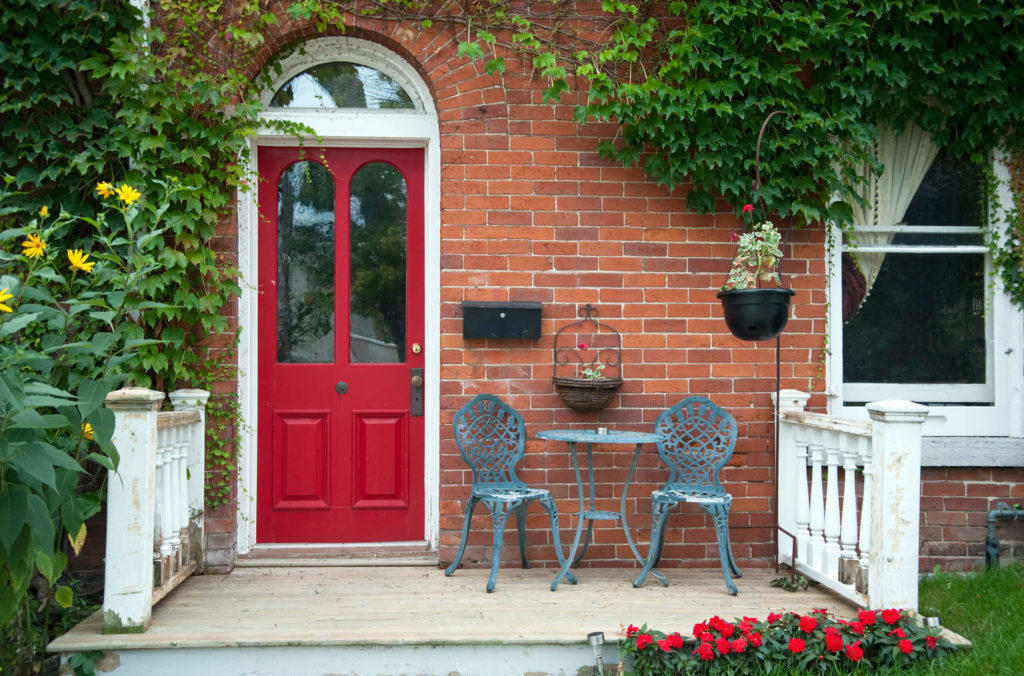 Red door with large windows